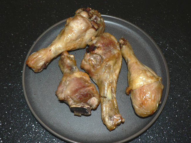 Air Fryer Chicken Legs on a Grey Plate