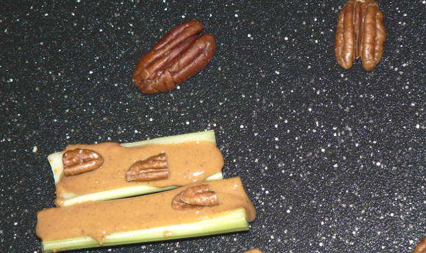 Easy, healthy, vegan and Keto snack that is very simple to make! Everyone will love this healthy ants on a log snack #vegan #vegetarian #vegetarianrecipes #glutenfree #glutenfreerecipes #sidedish #halloween #halloweensnacks #snacks #ketodiet #ketorecipes #lowcarb #lowcarbdiet #lowcarbrecipes