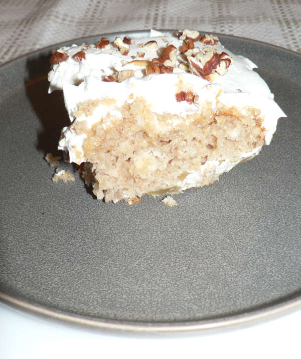 Caramel Apple Poke Cake Slice on a Plate