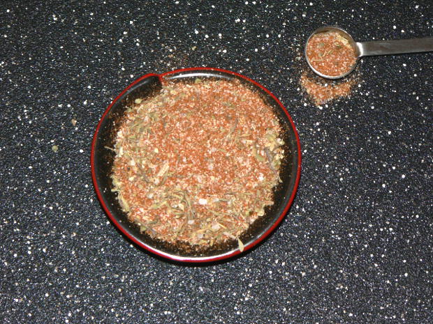 Cajun Seasoning on a black cutting board