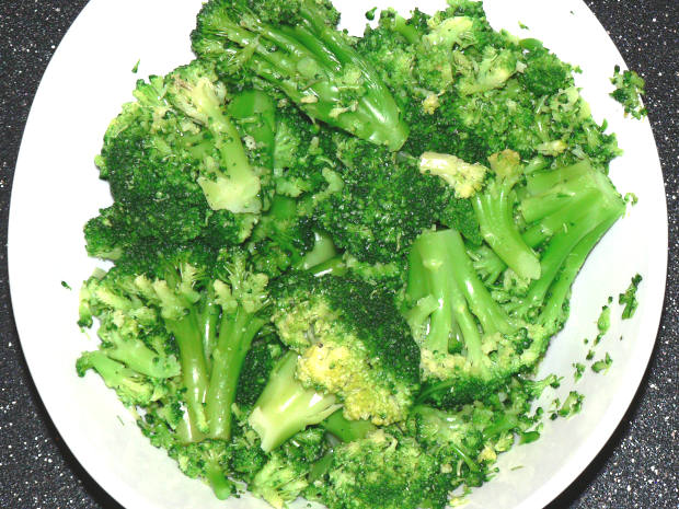 Microwaved Broccoli In White Bowl