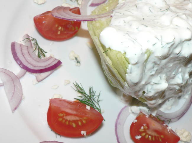 This Blue Cheese Wedge Salad is so healthy and delicious! Find out how to make this amazing steakhouse style salad #healthy #healthyrecipes #healthyfood #healthyeating #cooking #food #recipes #vegetarian #vegetarianrecipes #vegetables #ketodiet #ketorecipes #lowcarb #lowcarbdiet #lowcarbrecipes #glutenfree #glutenfreerecipes #sidedish #salads