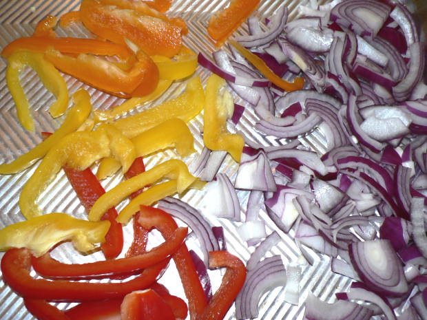 Colorful Peppers and Onions on a Sheet Pan