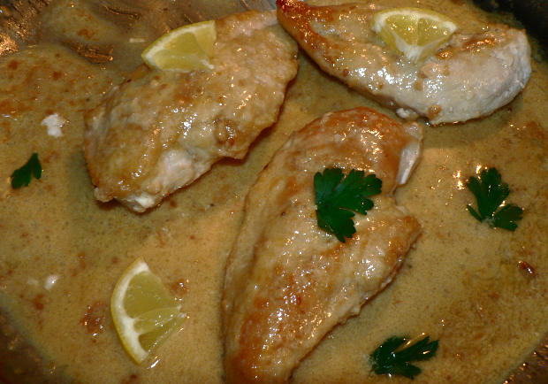 Garlic Butter Chicken Breast in Creamy Sauce on a Skillet