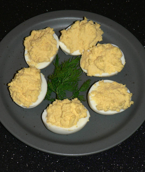 Traditional Deviled Eggs on a grey plate