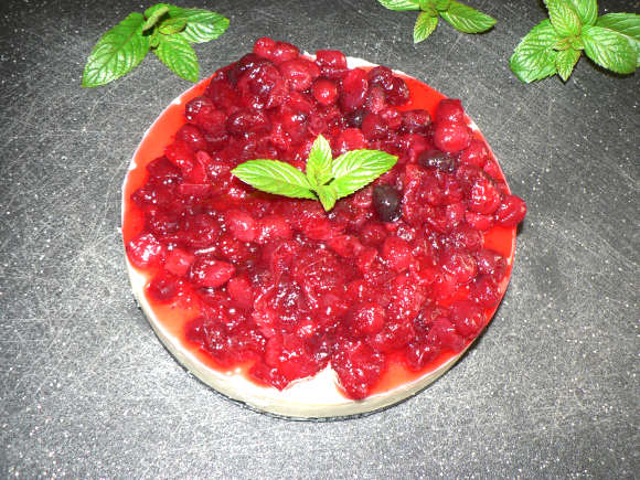 Insta pot Cranberry Cheesecake on a black cutting board