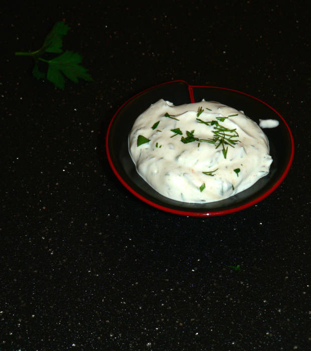 Ranch Dressing In A Small Black Bowl