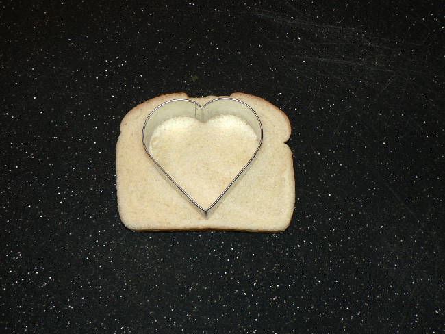 Heart Cookie Cutter on top of slice of bread