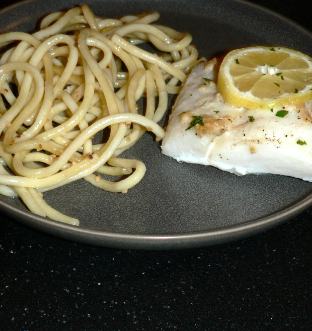 Baked Cod and Pasta on a Grey Plate