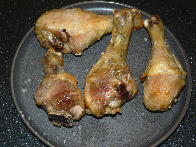 Garlic Butter Parmesan Chicken Drumsticks on a Plate