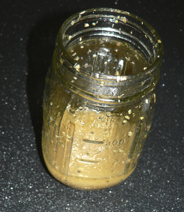 Greek salad dressing in a glass jar