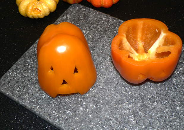 These amazing carved pumpkins are actually orange bell peppers, and they take just a few minutes to make. They are also low carb, Keto and vegan #glutenfree #glutenfreerecipes #dairyfree #halloween