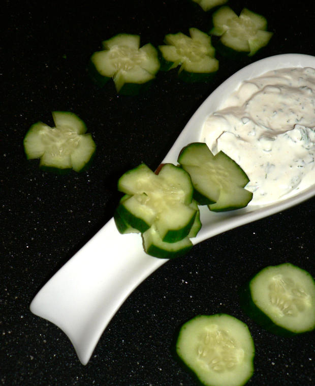 Healthy Ranch Dressing with cucumbers around it