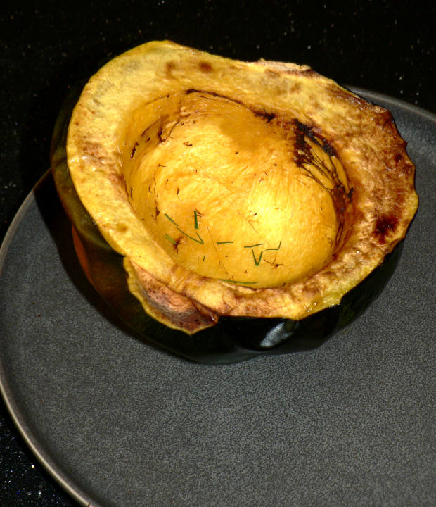 Air Fryer Baked Acorn Squash on a Grey Plate