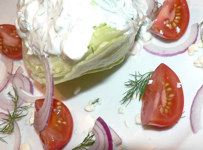 Did you know that it takes just a few minutes to make the most delicious Iceberg Wedge Salad? Find out the simple recipe for making a delicious, steak house style Blue Cheese Wedge Salad #healthy #healthyrecipes #healthyfood #healthyeating #cooking #food #recipes #vegetarian #vegetarianrecipes #vegetables #ketodiet #ketorecipes #lowcarb #lowcarbdiet #lowcarbrecipes #glutenfree #glutenfreerecipes #sidedish #salads