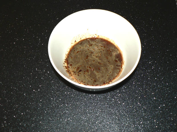 Coffee, Sugar and Water mixed together in a Bowl