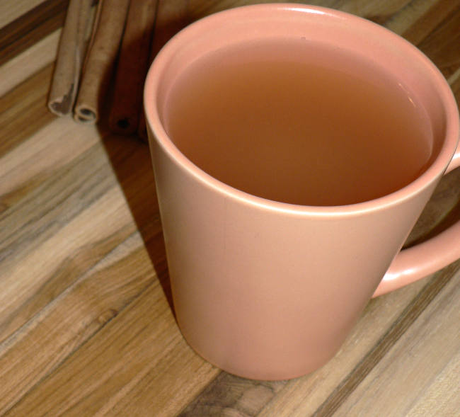 Easy Apple Cider on a Wood Cutting Board