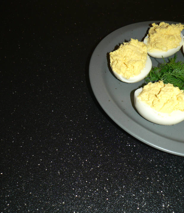 Half of a plate with Classic Deviled Eggs