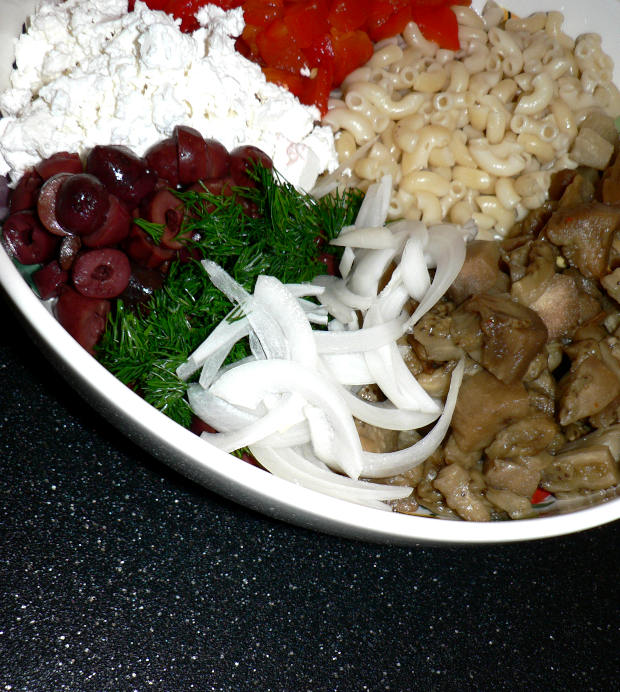 Chopped veggies and pasta in a bowl