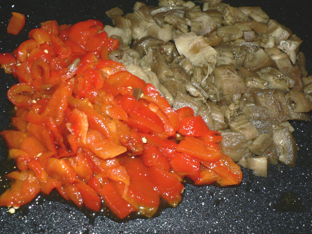 Chopped roasted eggplants and red bell peppers