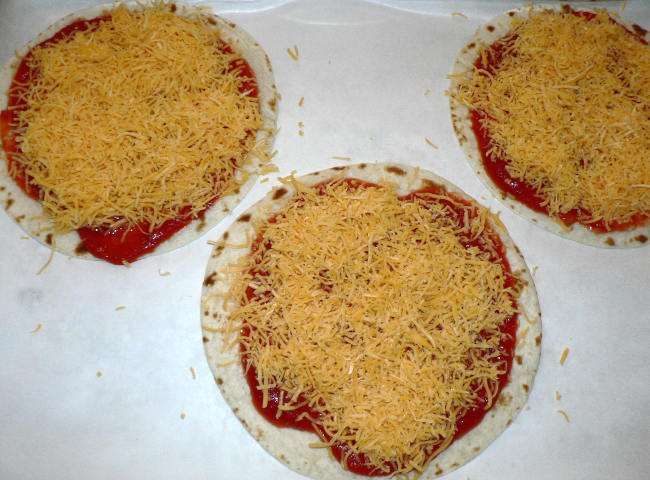 Tortillas with tomato sauce and cheese