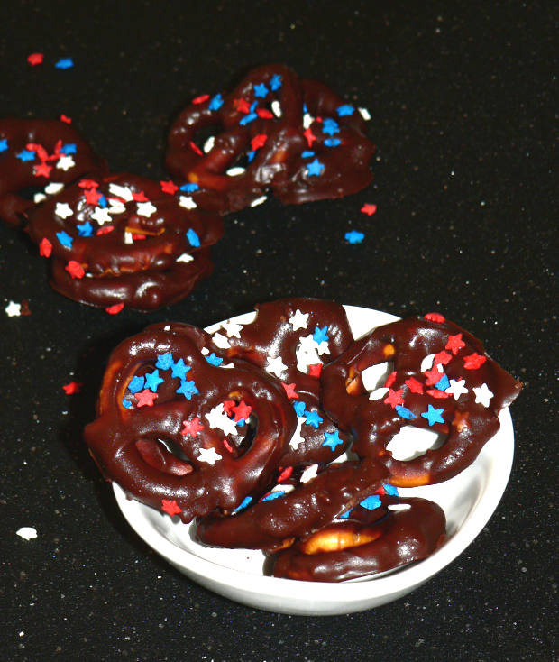 Patriotic Chocolate Covered Pretzels in a Small White Bowl
