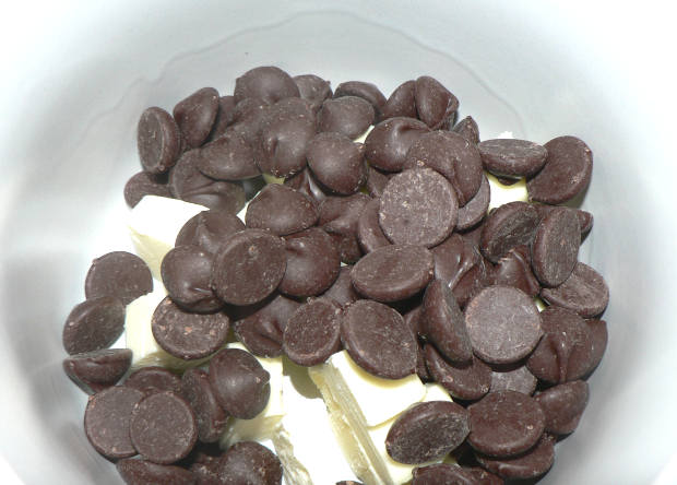 Chocolate Chips and Butter in a White Cup