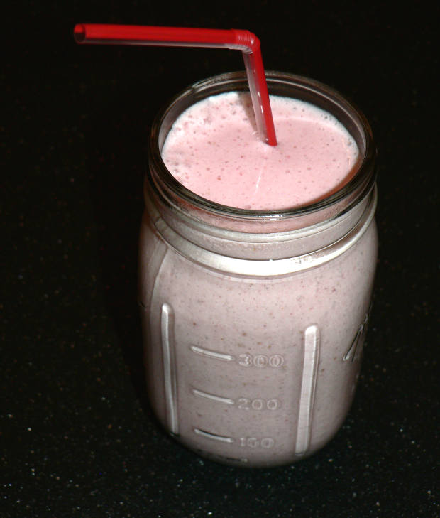Strawberry Banana Smoothie On a Black Surface