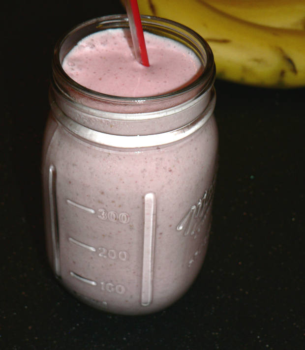 Strawberry Smoothie With A Straw