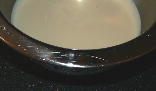 Sweetened Condensed Milk in a Silver Bowl