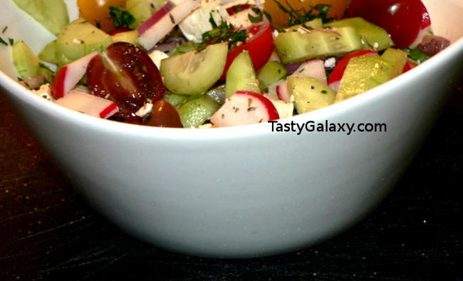 Easy Greek Salad Recipes, this delicious Greek Salad Recipe comes together in no time! Just combine the ingredients, and dress with our very simple Greek Salad Dressing, made with just a few ingredients! You will love this delicious Greek Salad #greek #olive #onion #tomatoes #vegetarian #vegetables #vegetarianrecipes